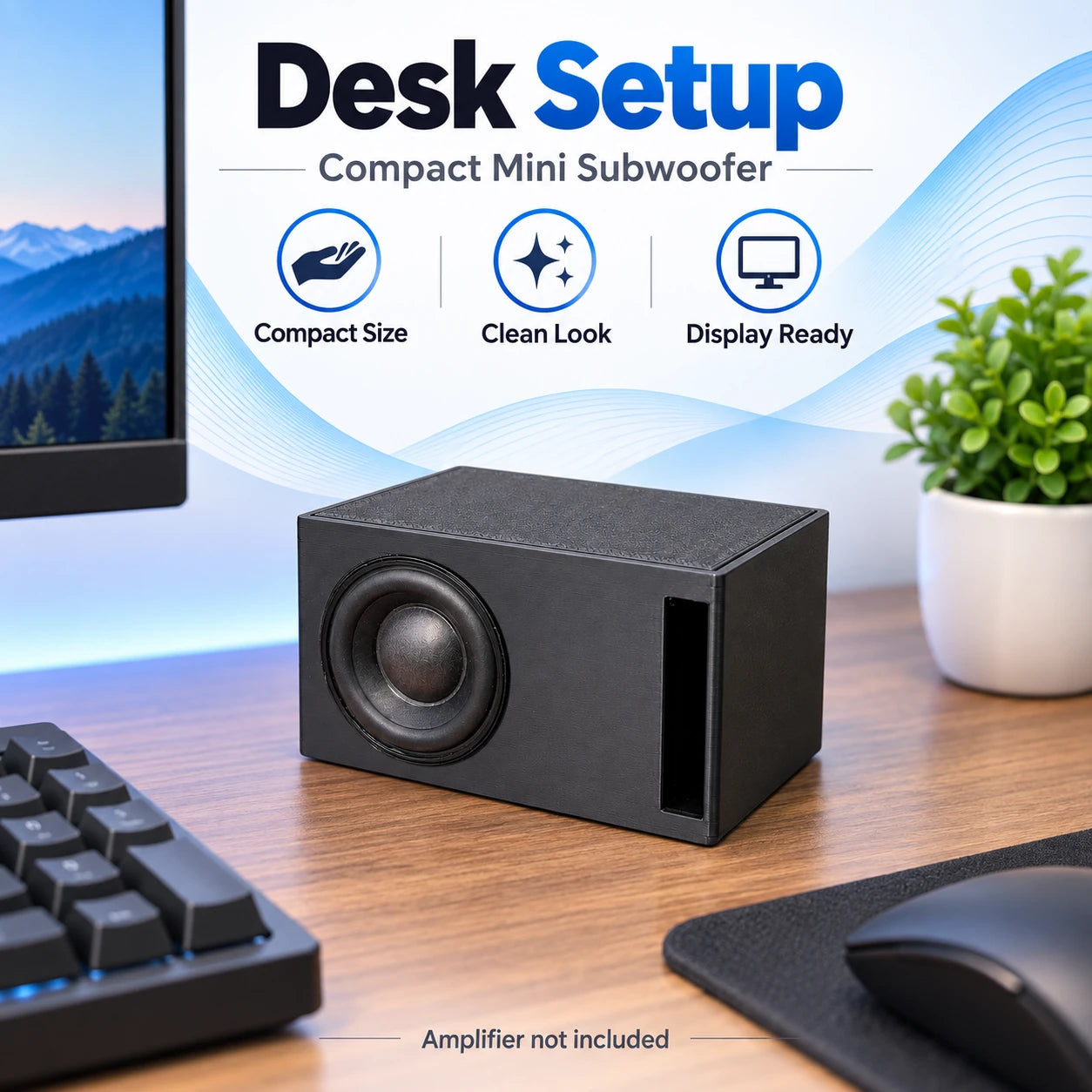 Desk setup lifestyle image showing the Mini Subwoofer on a computer desk